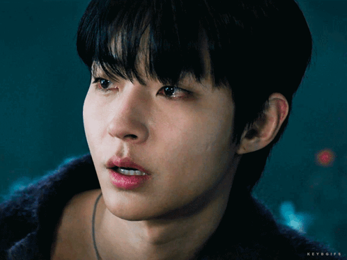 A Close Up Of A Young Man 'S Face With The Words Keyboifs Written Below Him GIF