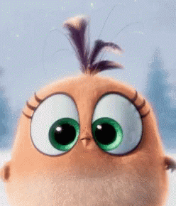 A Close Up Of An Angry Birds Character With Big Green Eyes GIF