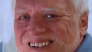A Close Up Of An Elderly Man 'S Face With A Smile On His Face And Teeth . GIF