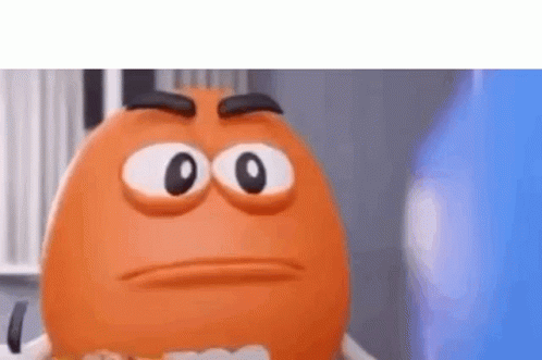 A Close Up Of An Orange Cartoon Character With Big Eyes And A Serious Face . GIF