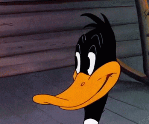 a close up of daffy duck 's face with a big smile