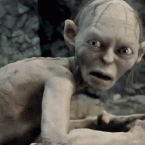 A Close Up Of Gollum From The Lord Of The Rings Making A Funny Face GIF