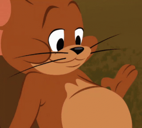 A Close Up Of Jerry From Tom And Jerry Looking At The Camera GIF