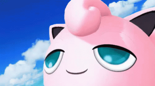 A Close Up Of Jigglypuff 'S Face Against A Blue Sky With Clouds GIF