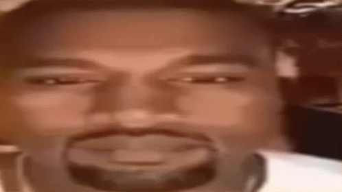 A Close Up Of Kanye West 'S Face With A Beard . GIF