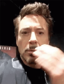 A Close Up Of Robert Downey Jr. 'S Face With A Beard . GIF