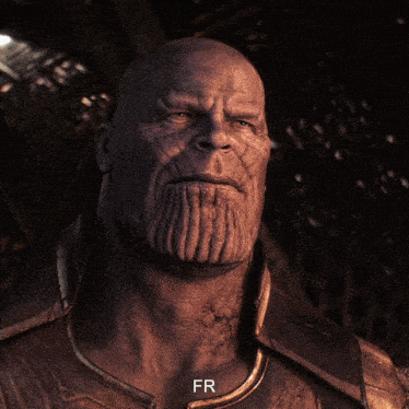 A Close Up Of Thanos ' Face With The Letters Fr Visible GIF