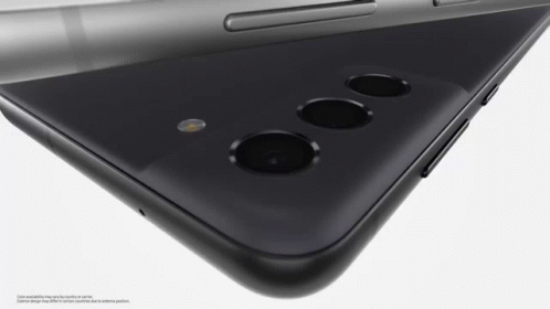 A Close Up Of The Back Of A Phone With The Words Color Availability May Vary By Country Or Operator GIF
