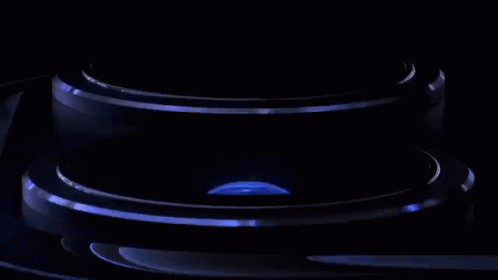 A Close Up Of The Camera Lens Of A Cell Phone Against A Black Background . GIF
