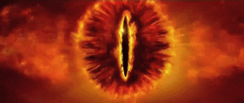 A Close Up Of The Eye Of Sauron From The Lord Of The Rings Surrounded By Flames . GIF