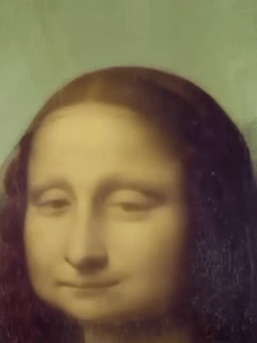 A Close Up Of The Face Of A Woman With Her Eyes Closed . GIF