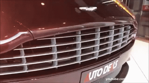 A Close Up Of The Front Of A Car With A License Plate That Says Uto Deus GIF