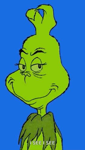 A Close Up Of The Grinch 'S Face With The Words `` I See I See '' Written Below It . GIF