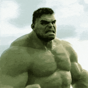 A Close Up Of The Hulk 'S Face And Chest GIF