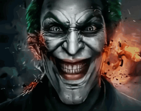 A Close Up Of The Joker 'S Face With A Huge Smile GIF