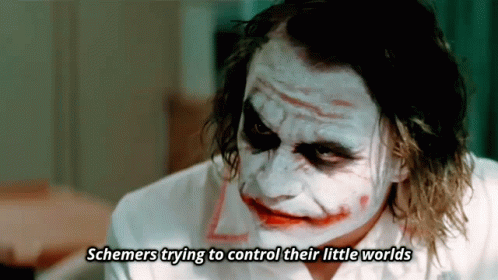A Close Up Of The Joker With The Words Schemers Trying To Control Their Little Worlds Written Below Him GIF