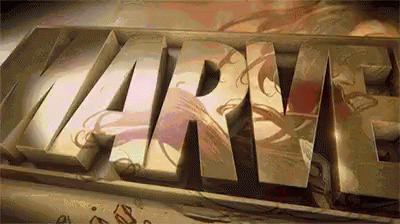 Close Up Of Marvel Text On Table GIF