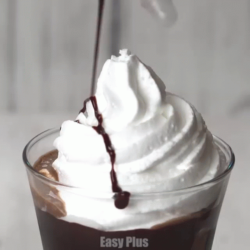 A Close Up Of Whipped Cream With Easy Plus Written In The Bottom Right Corner GIF