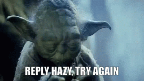 A Close Up Of Yoda 'S Face With The Words Reply Hazy Try Again GIF