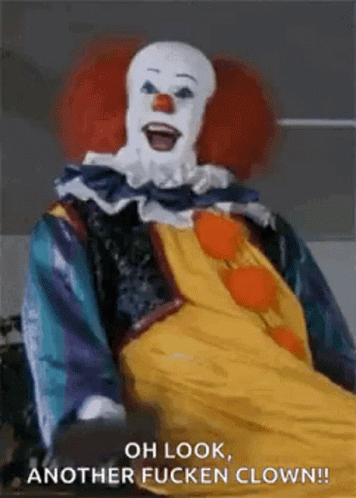 A Clown Is Sitting In A Wheelchair With The Words `` Oh Look , Another Fucken Clown '' Written On It . GIF