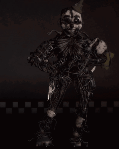A Clown With A Skull On His Face Is Holding A Knife In His Hand GIF
