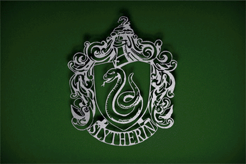 A Coat Of Arms With The Words " Hufflepuff " On It GIF