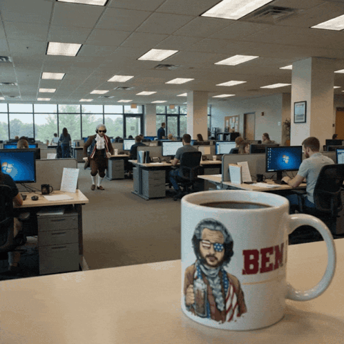 A Coffee Mug That Says Ben On It GIF