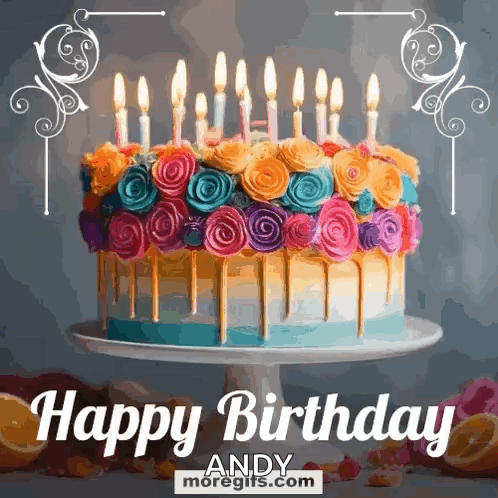 A Colorful Birthday Cake With Candles And Flowers On A Cake Stand . GIF