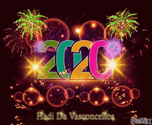 A Colorful Fireworks Display With The Year 2020 GIF