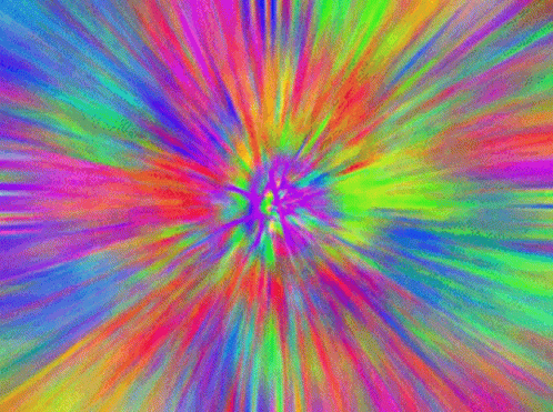A Colorful Kaleidoscope With A Yellow Center In The Middle GIF