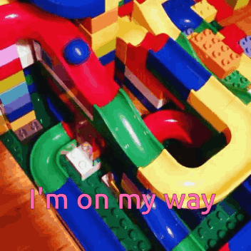 A Colorful Lego Maze With The Words I 'M On My Way GIF