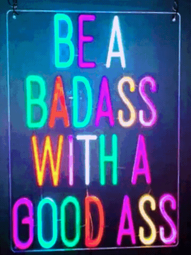 a colorful neon sign that says be a badass with a good ass