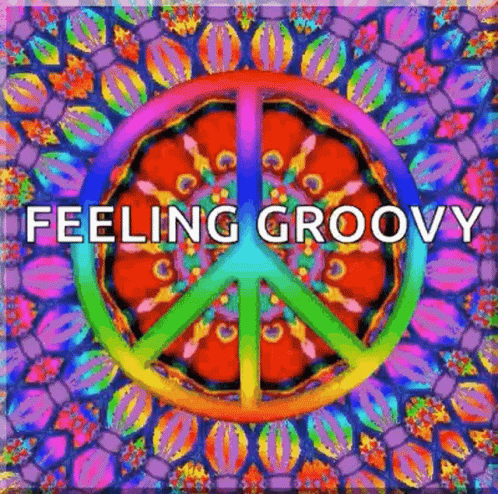A Colorful Peace Sign With The Words `` Feeling Groovy '' Written Inside Of It GIF