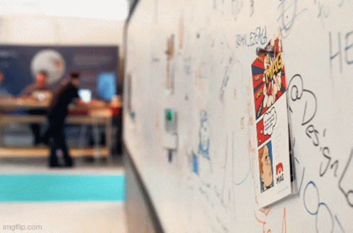 A Comic Book Is Hanging On A White Board With Graffiti On It Including One That Says ' Imgflip.com ' GIF