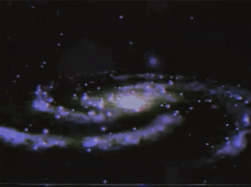 A Computer Generated Image Of A Galaxy With A Star In The Middle GIF