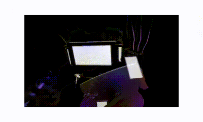 A Computer Generated Image Of A Purple Glowing Object In The Dark GIF