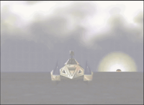 A Computer Generated Image Of A Pyramid In The Middle Of A Desert GIF