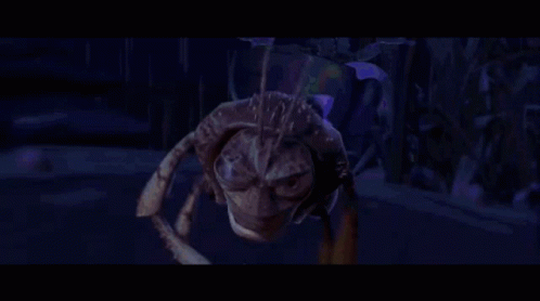 A Computer Generated Image Of A Spider With A Face GIF