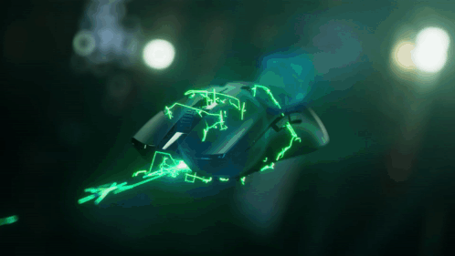 A Computer Mouse Is Glowing In The Dark And Has Arrows Pointing In Different Directions GIF