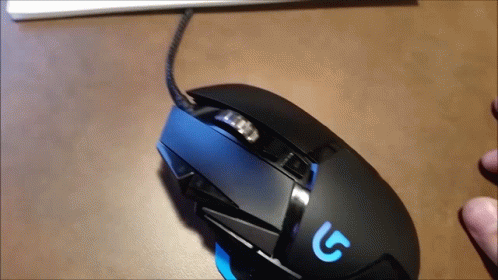 A Computer Mouse With The Letter G On The Side GIF