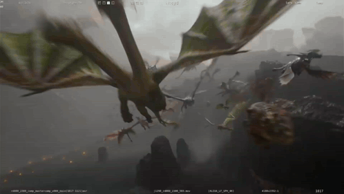 A Computer Screen Shows A Dragon Flying Over A Mountain GIF