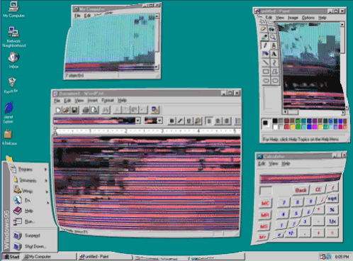 A Computer Screen With A Calculator And A Notepad App GIF