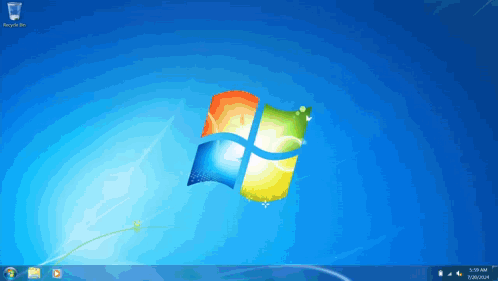 A Computer Screen With A Recycle Bin On The Left GIF