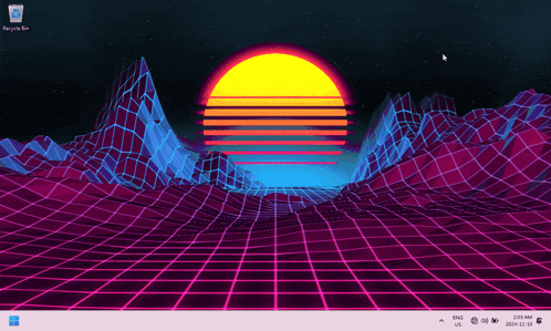 A Computer Screen With A Sunset And A Recycle Bin On It GIF