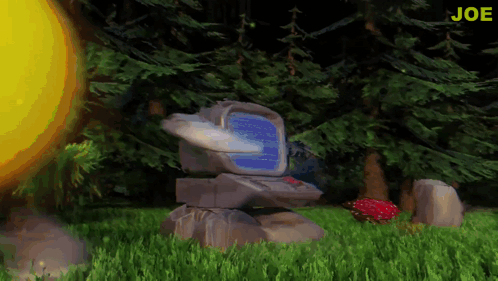 A Computer Sitting In The Grass With The Word Joe In The Corner GIF