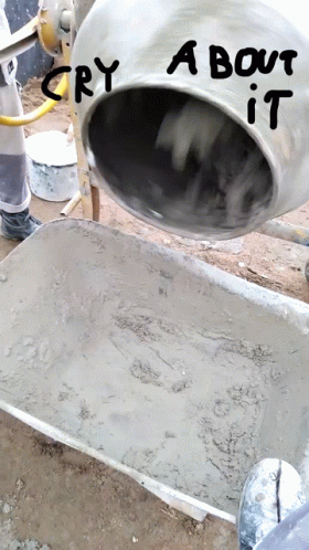 A Concrete Mixer Is Pouring Concrete Into A Wheelbarrow With The Words " Cry About It " Written On It GIF
