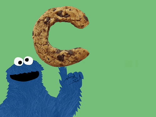 A Cookie Monster Holds A Cookie In The Shape Of The Letter C GIF