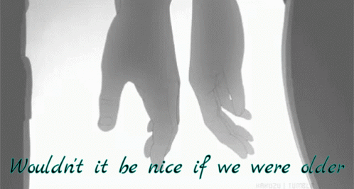 A Couple Holding Hands With The Words " Wouldn T It Be Nice If We Were Older " Below Them GIF