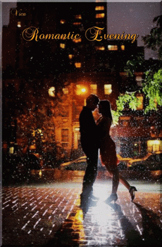 A Couple Kissing In The Rain With The Words Romantic Evening GIF