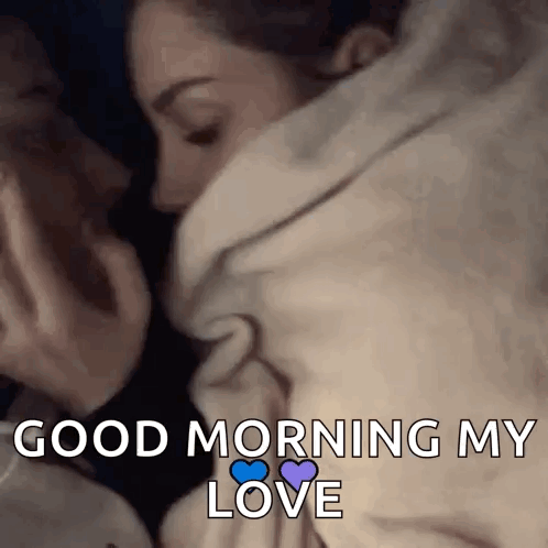 A Couple Kissing Under A Blanket With The Words `` Good Morning My Love '' Written Below Them . GIF